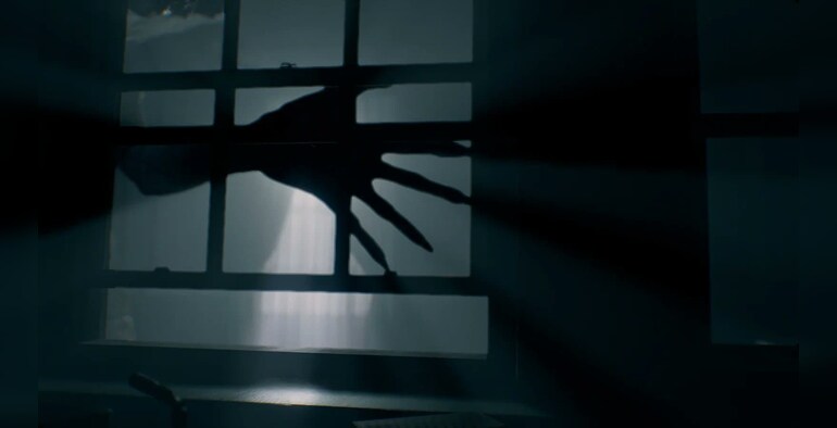 Grace is hunted by a grotesque, shambling beast with a sickly skin, bulging eyes, massive hands