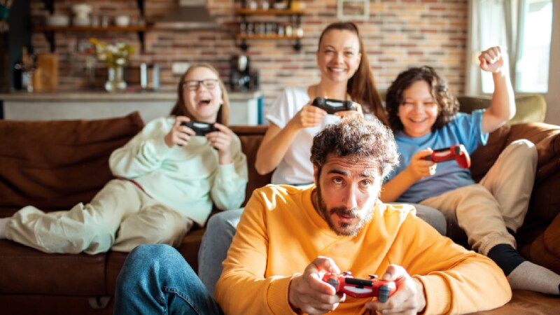 Family playing video games together